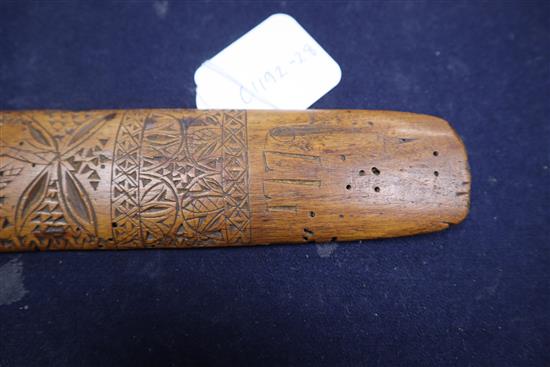 An 18th century treen stay busk dated 1770 and initialled SL length 30cm